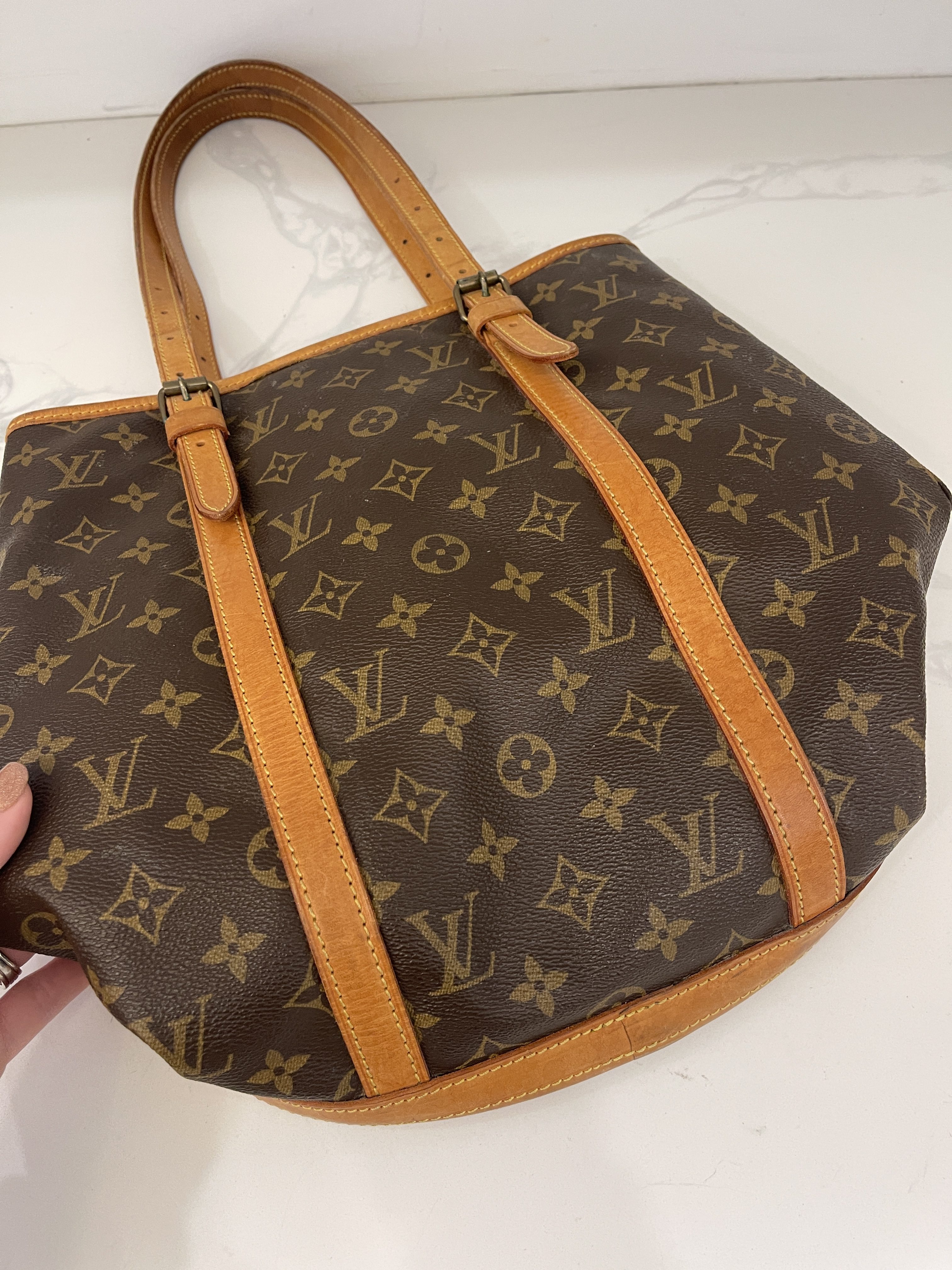 Louis Vuitton, Bags, Authenticity Guarantee Louis Vuitton Babylone Hand  Tote Bag Purse Monogram Canva