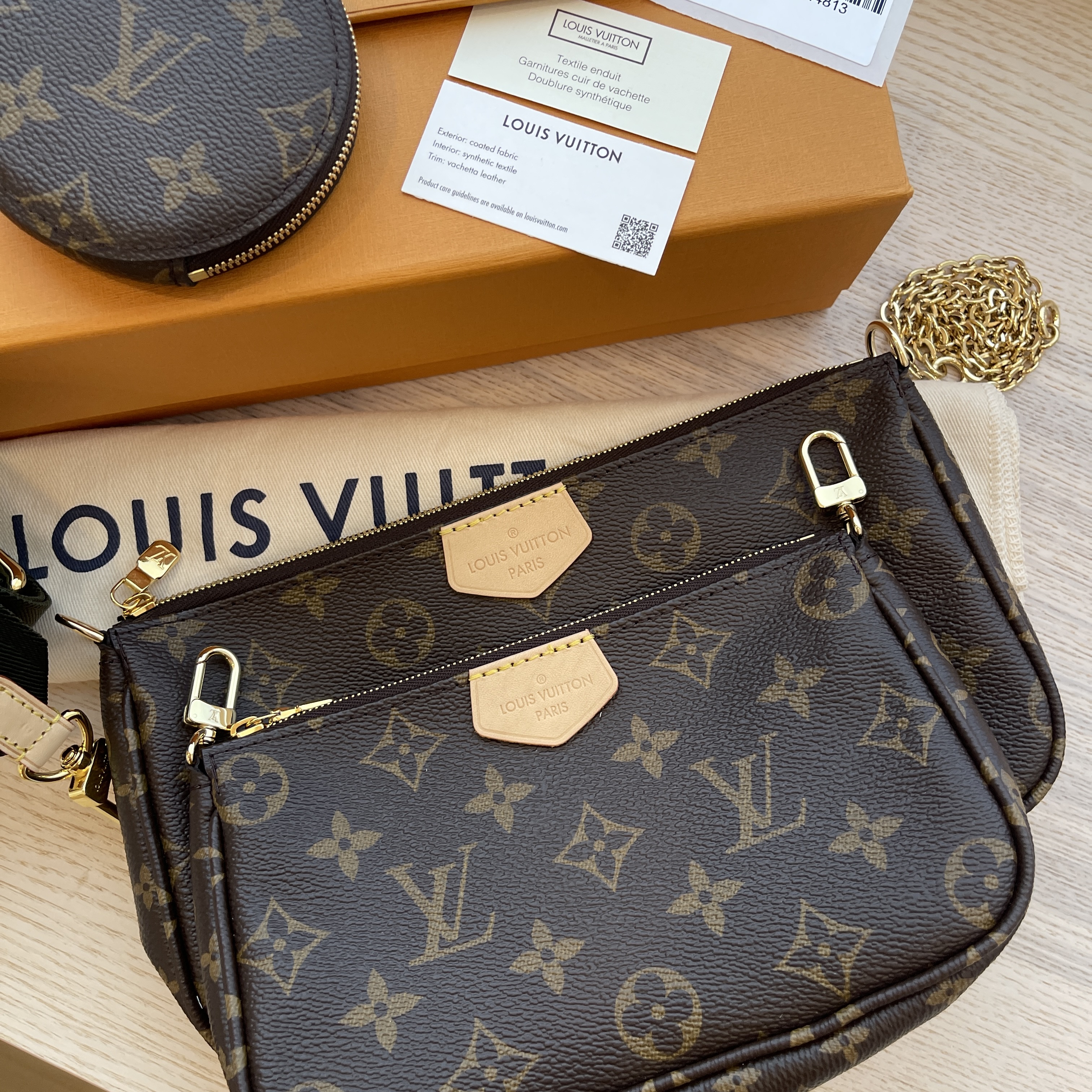 Pochette accessoire handbag Louis Vuitton Brown in Synthetic