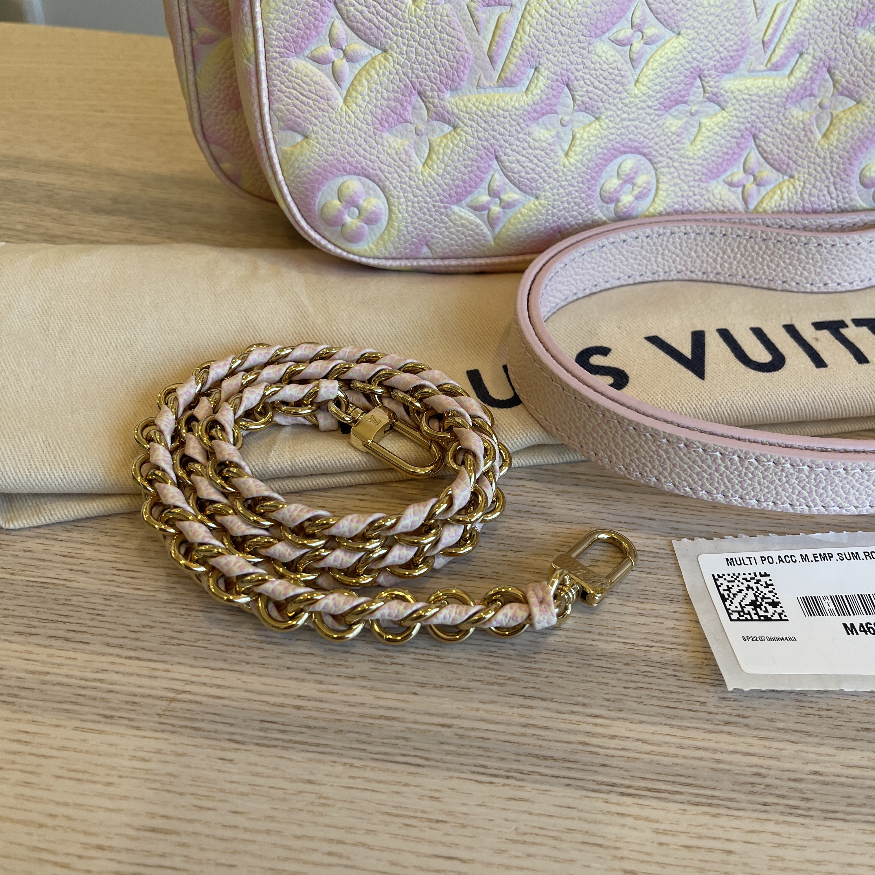 Louis Vuitton Light Pink Monogram Empreinte Leather Summer Stardust  Multi-Accessories Pochette Bag - Yoogi's Closet