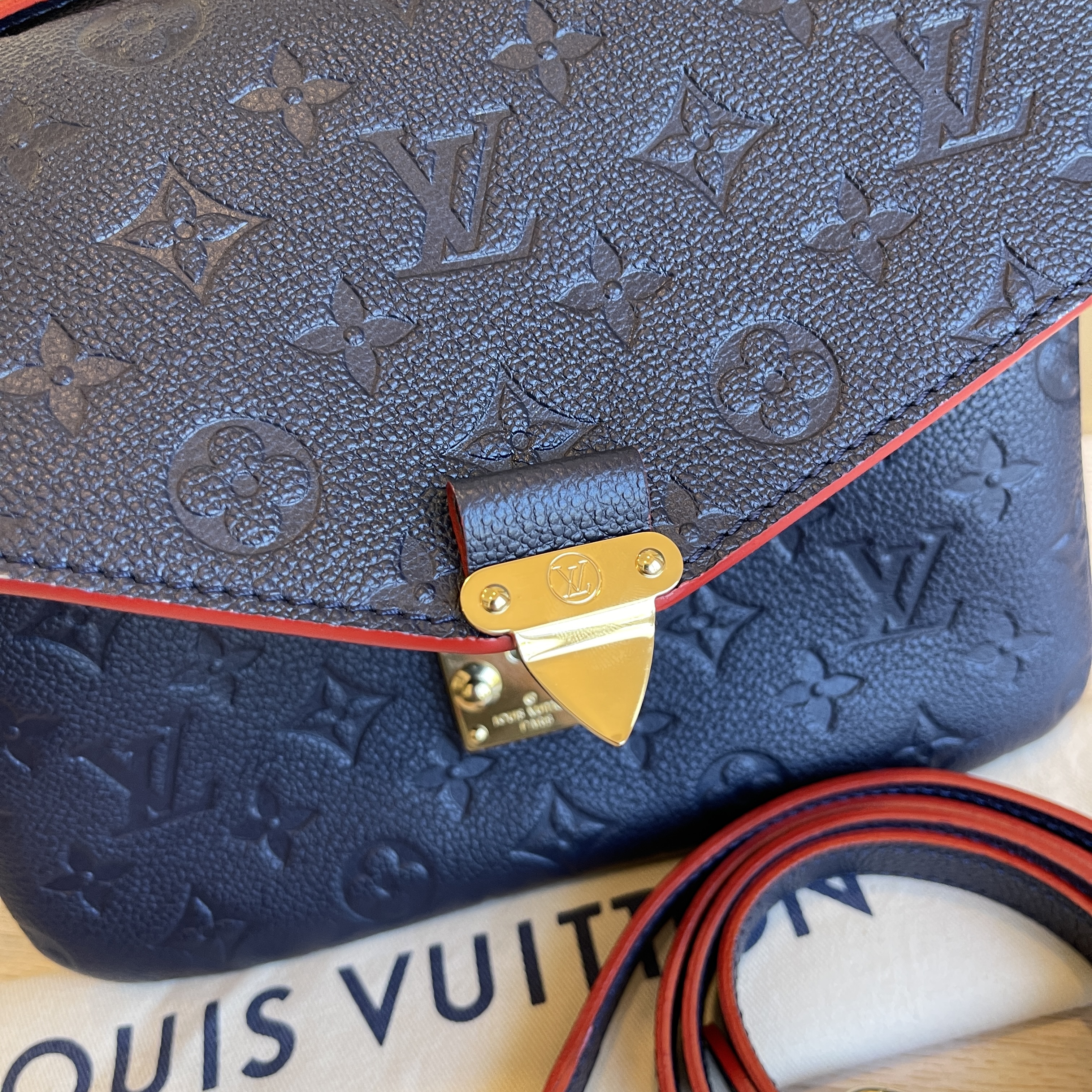 Louis Vuitton Marine Rouge Navy Blue Empreinte Pochette Metis For