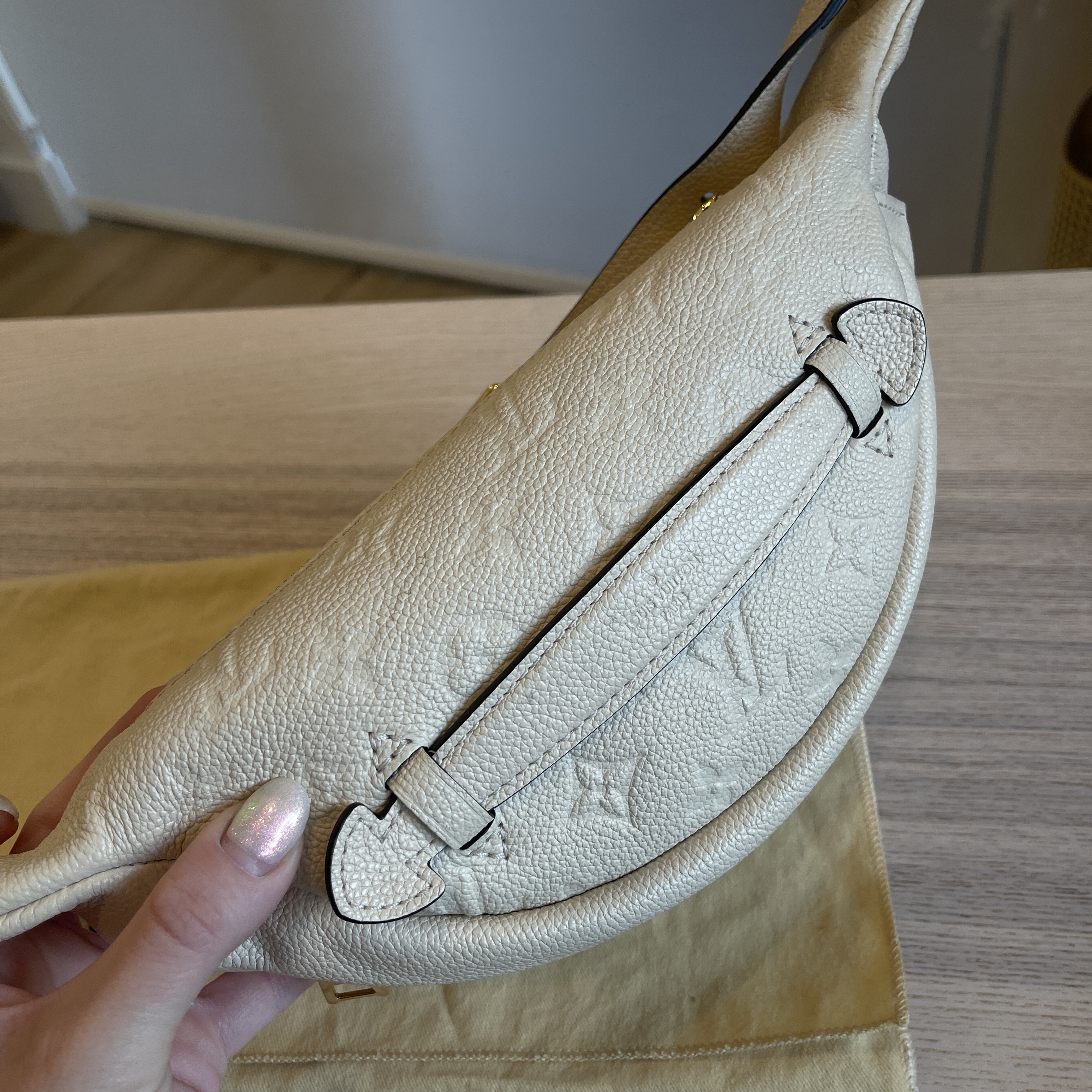 Monogram Empreinte Creme bumbag…Was this one quickly discontinued or only a  limited number produced? Can't even find it preloved : r/Louisvuitton