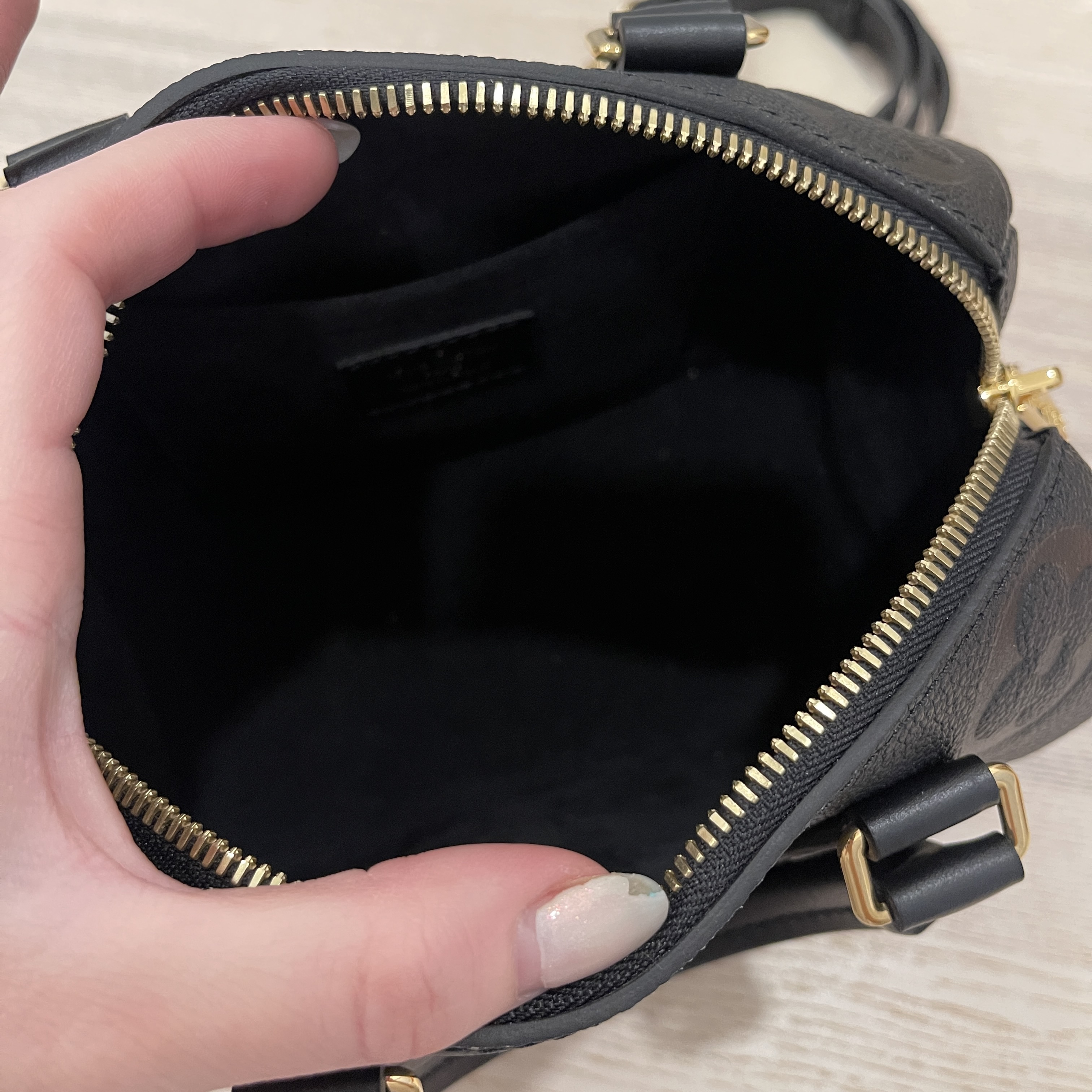 Louis Vuitton Black Giant Monogram Empreinte Speedy Bandoulière 20 Gold Hardware, 2021, Womens Handbag