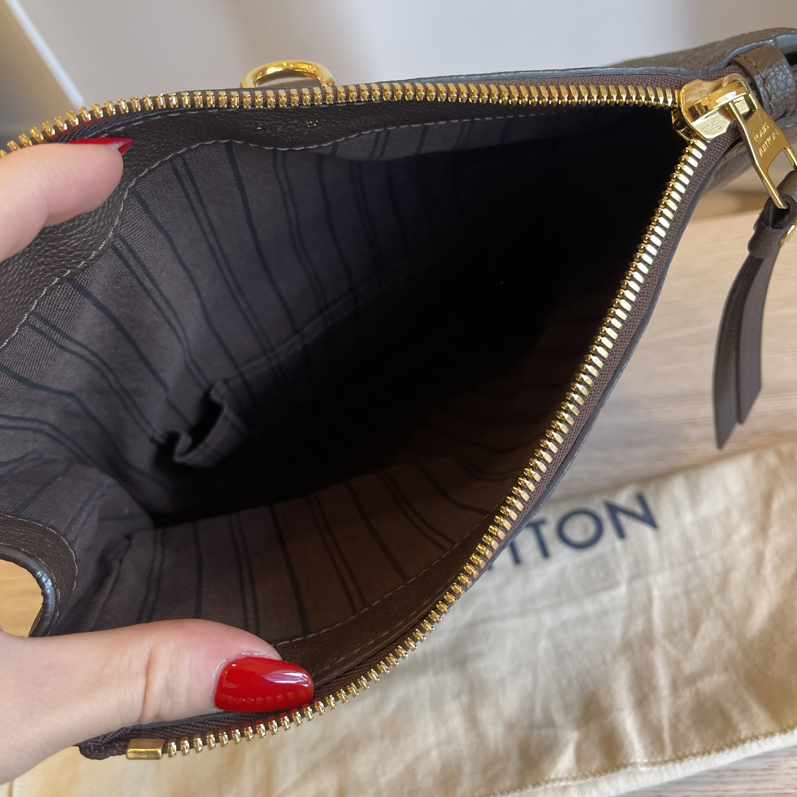 Louis Vuitton Orage Monogram Empreinte Leather Petillante Clutch at 1stDibs