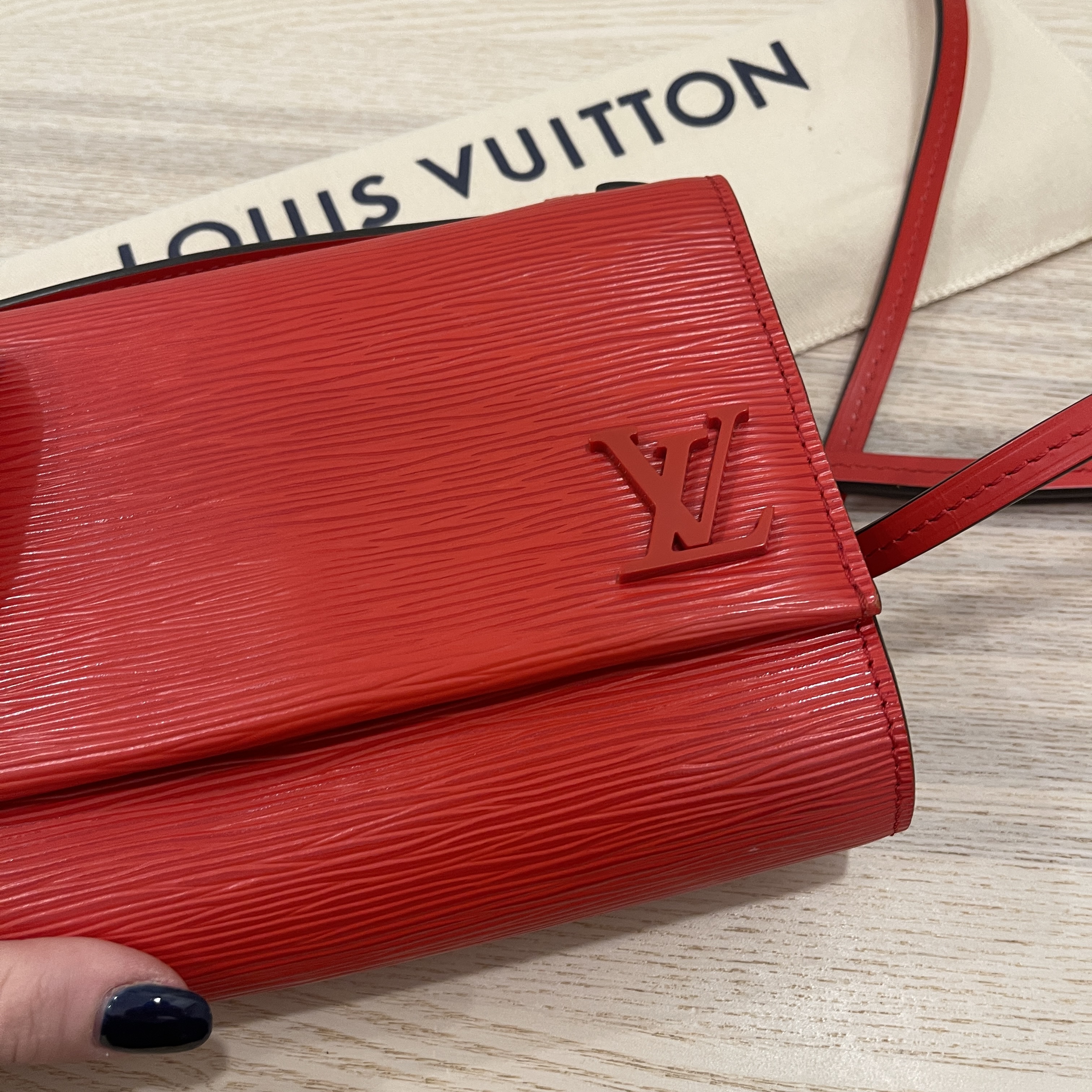 Louis Vuitton Epi Leather Clery M54537 $230