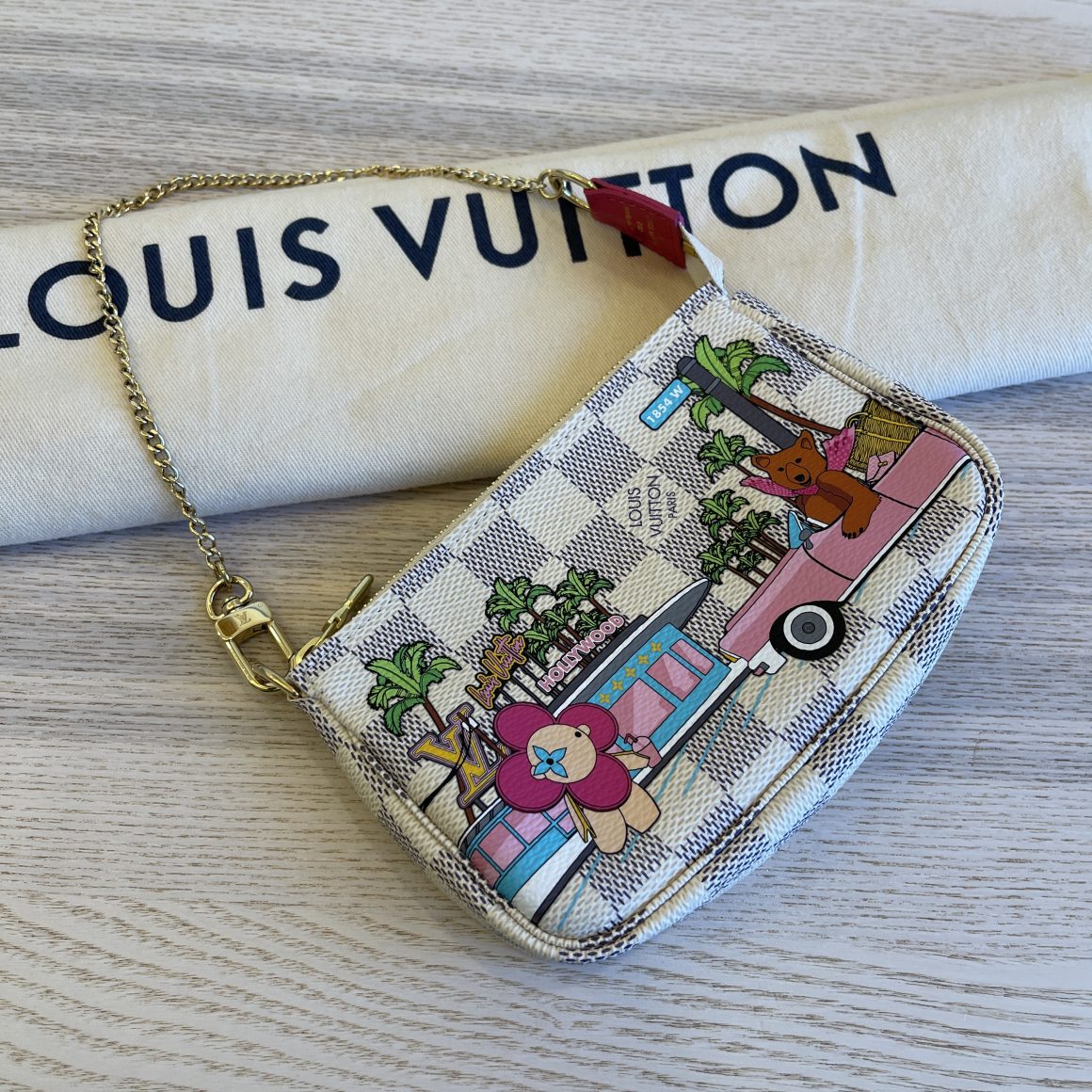 Limited Edition Mini Pochette Wristlet, Evasion, Louis Vuitton