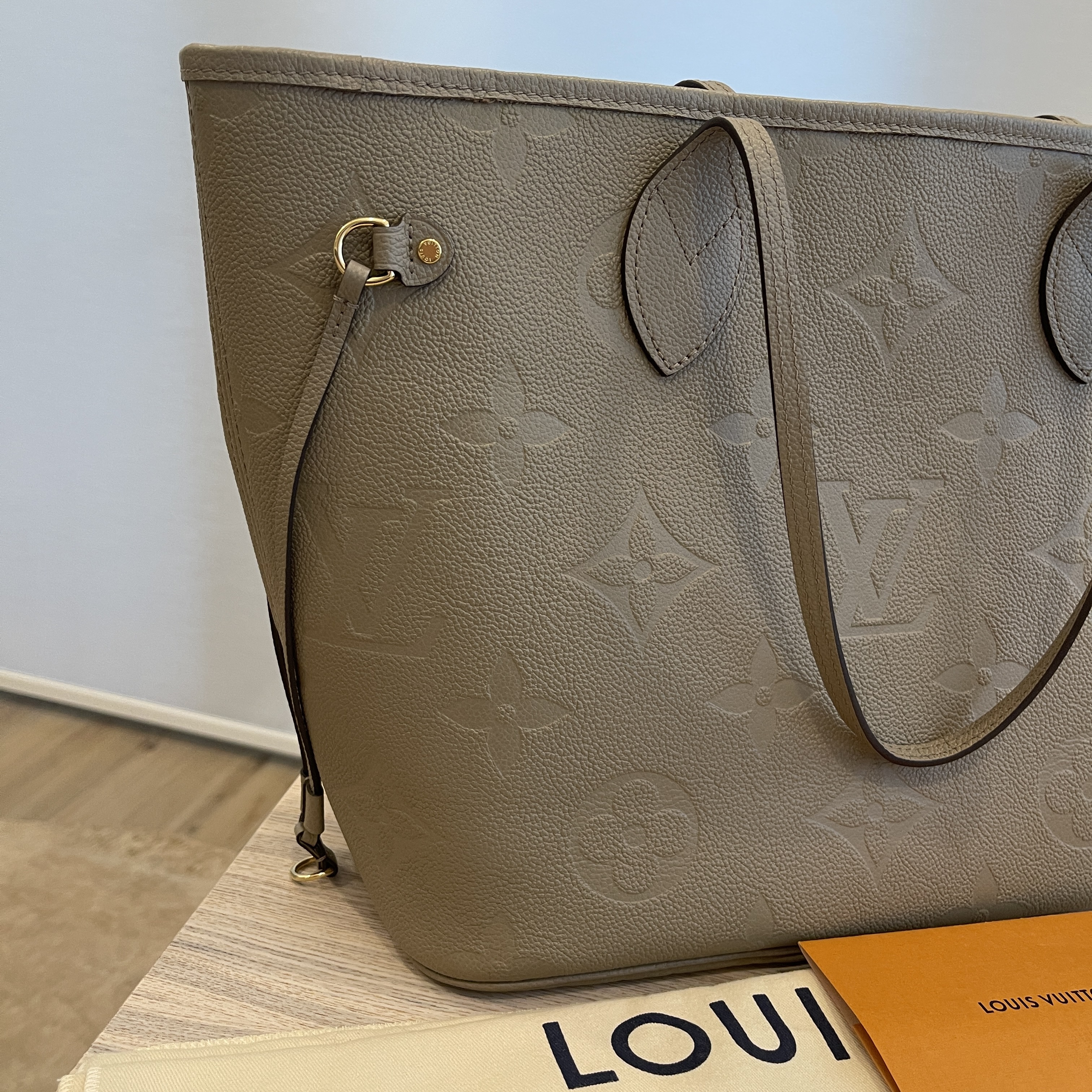 Louis Vuitton Tourterelle Monogram Giant Empreinte Leather Neverfull Bag
