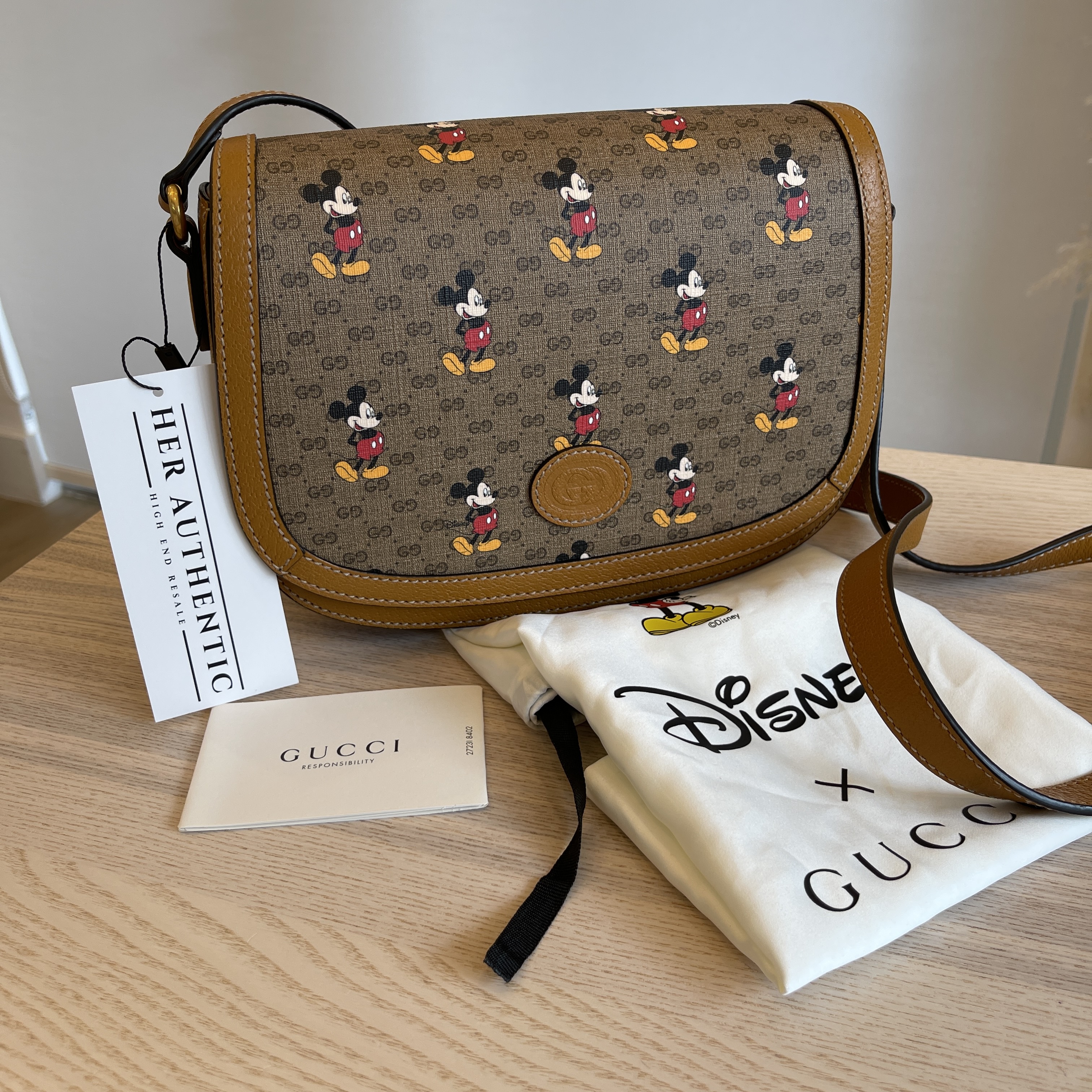 Gucci x Disney Pouch Mini GG Supreme Mickey Mouse Beige in Coated  Canvas/Leather with Antique Gold-tone - US