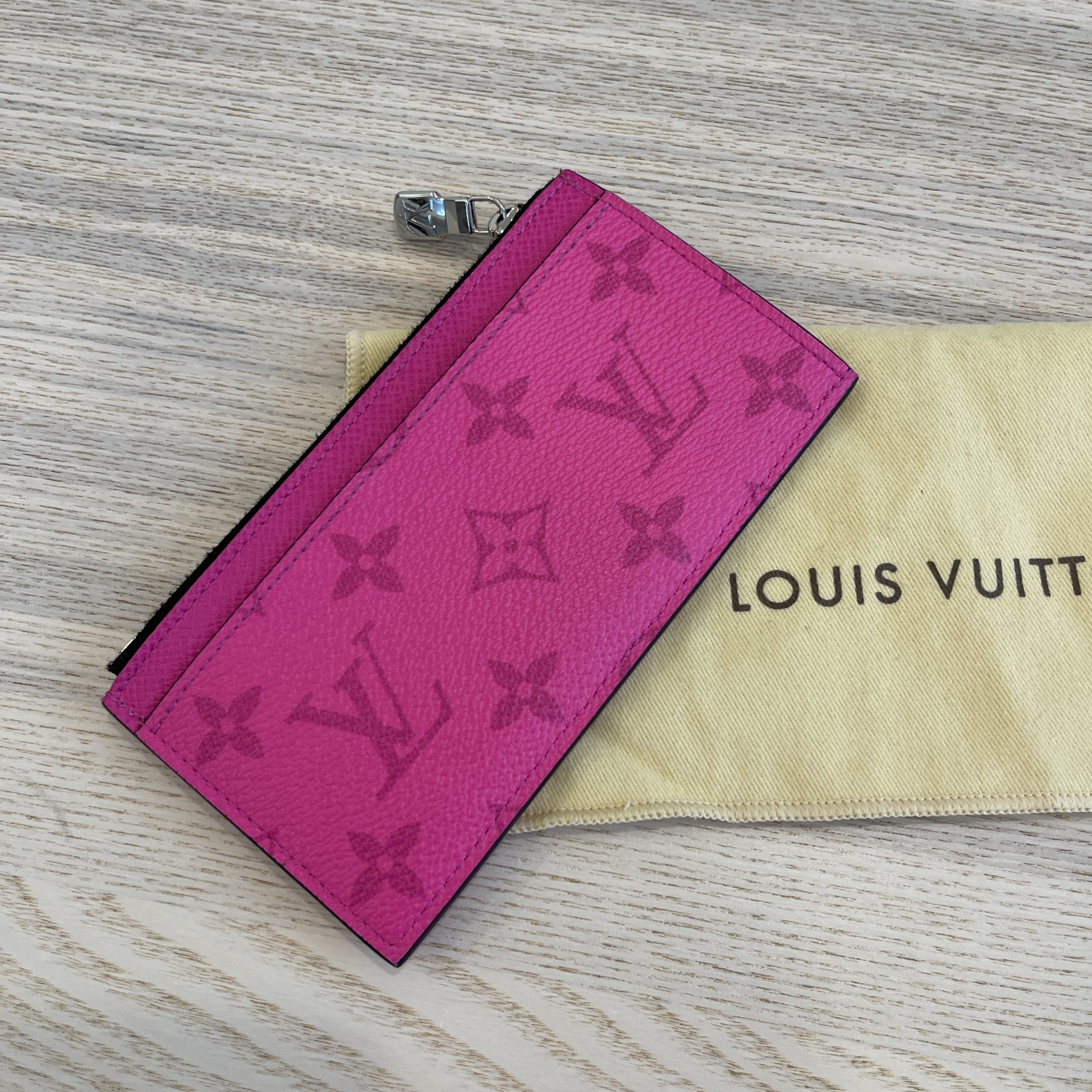 Pink is the new Black Louis Vuitton Taigarama Fuchsia Card Coin Holder.  Amazing color, get it while u have time before the season…