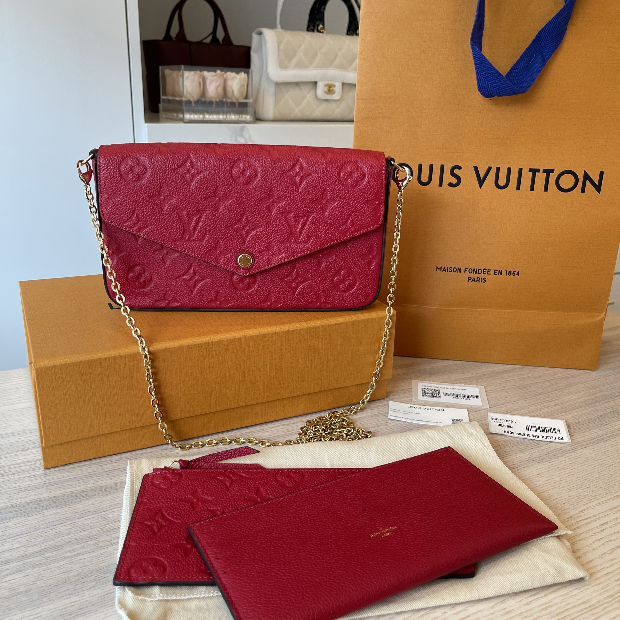 LOUIS VUITTON Empreinte Pochette Felicie Chain Wallet Scarlet | FASHIONPHILE