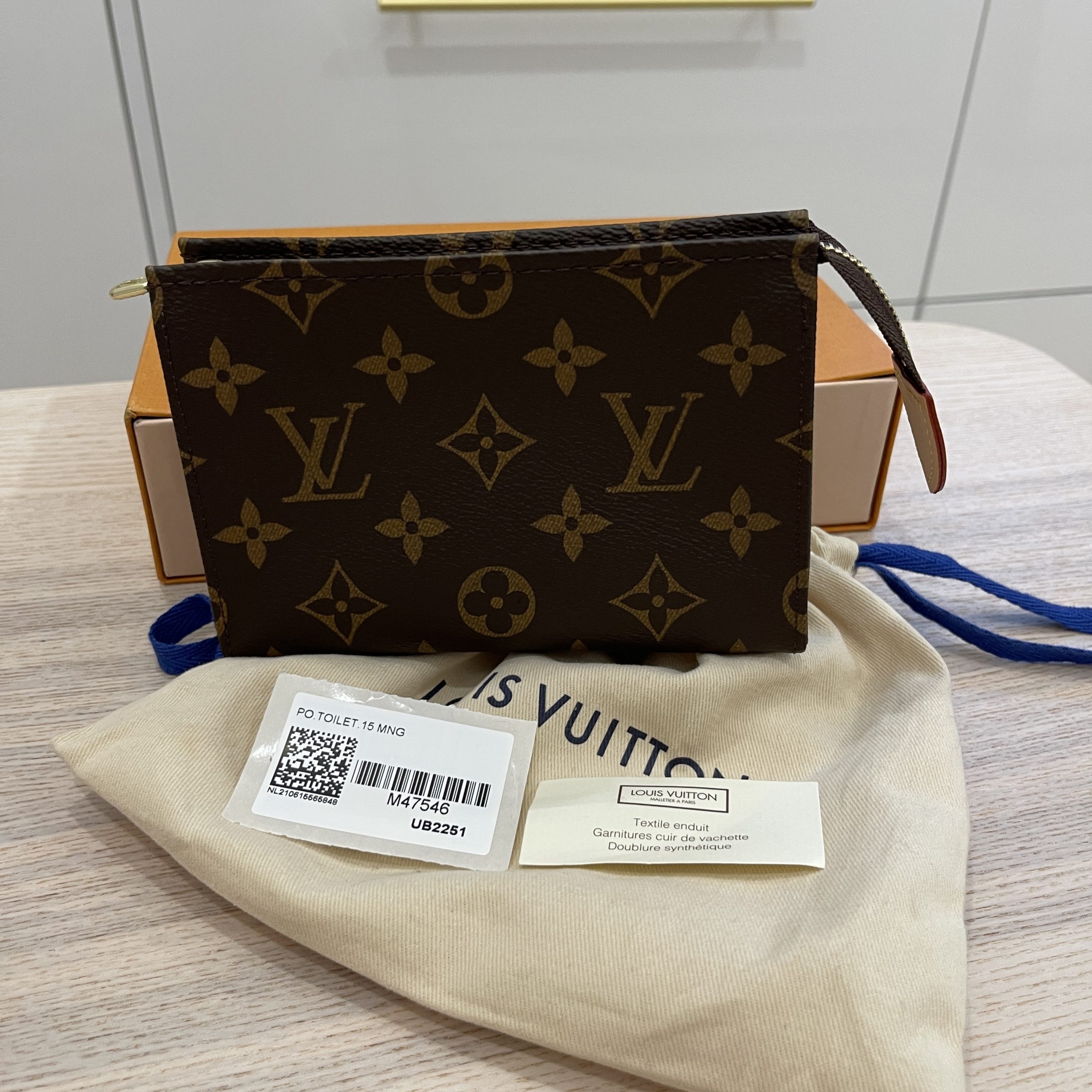 New Louis Vuitton Monogram Toiletry Clutch in Box