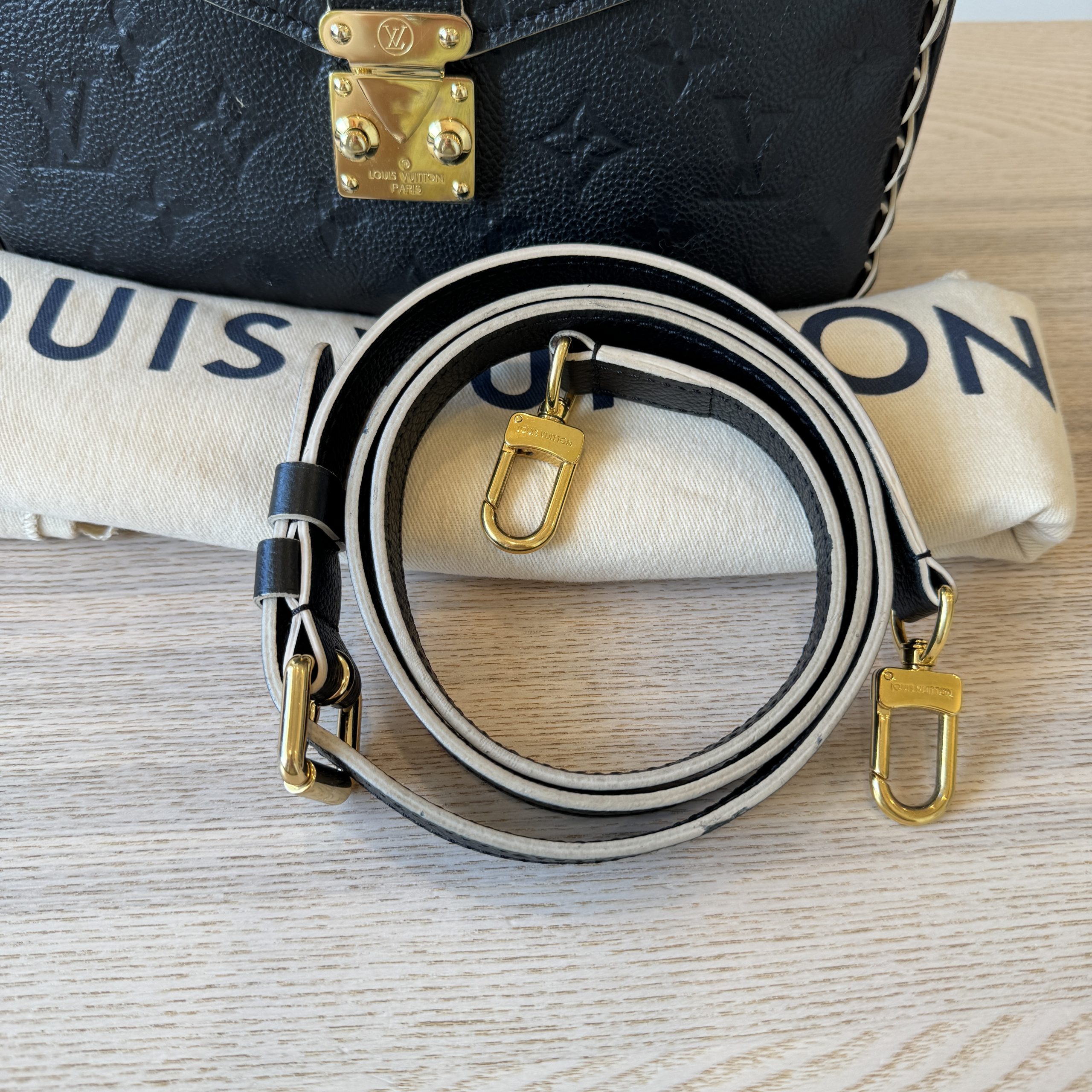 Louis Vuitton Braided Handle Pochette Metis Monogram Empreinte Leather at  1stDibs