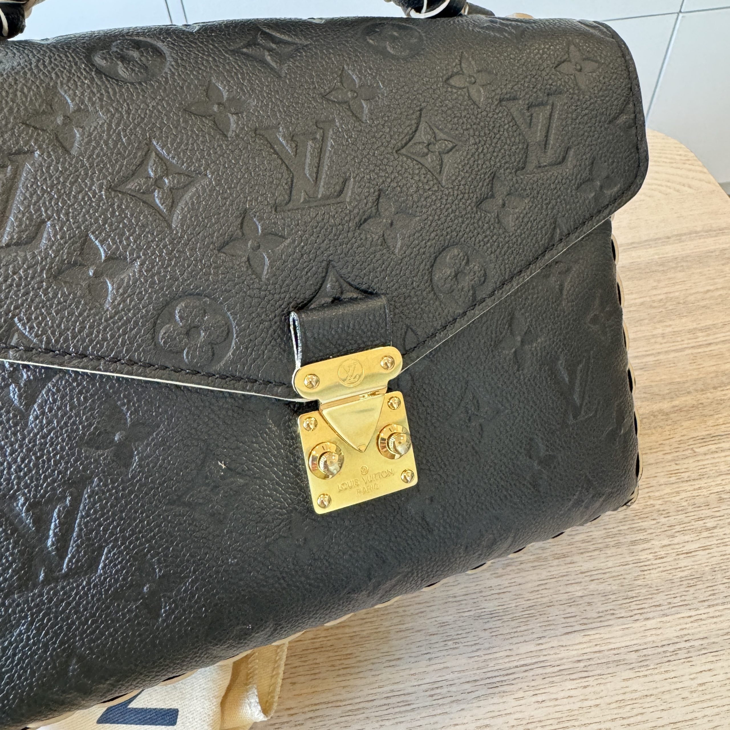 Louis Vuitton Braided Handle Pochette Metis Monogram Empreinte Leather at  1stDibs