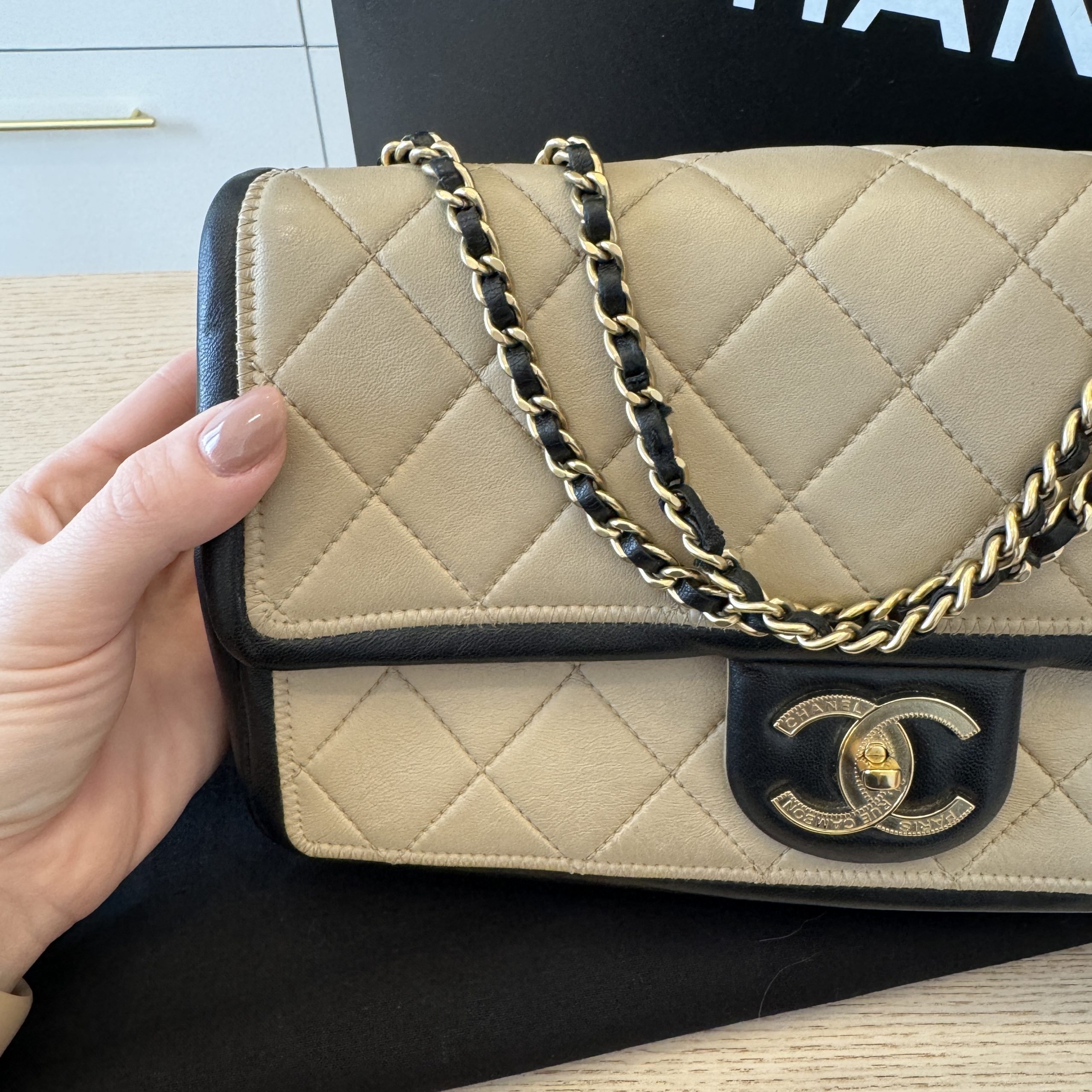 Chanel beige and hot sale black bag