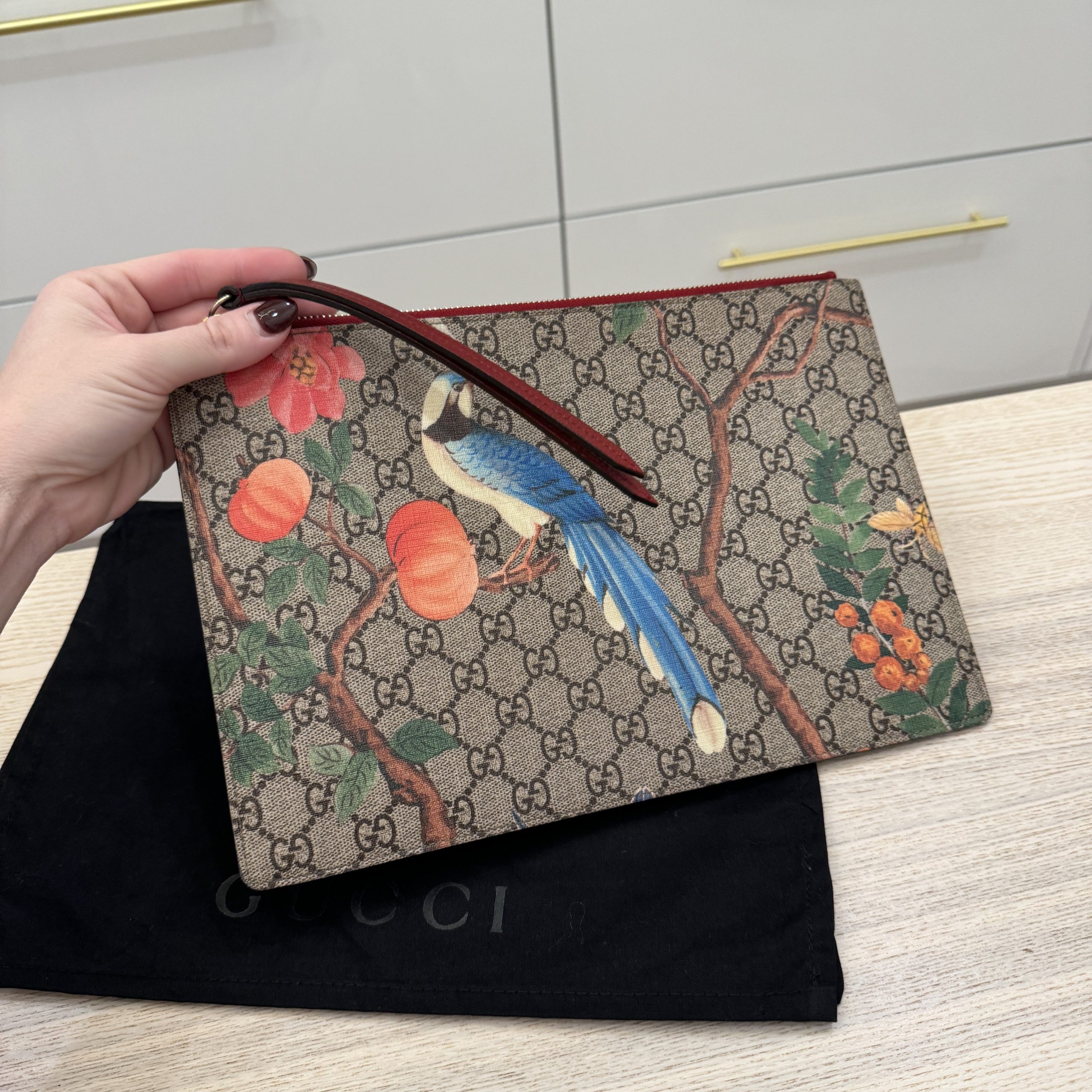 Gucci tian pouch online